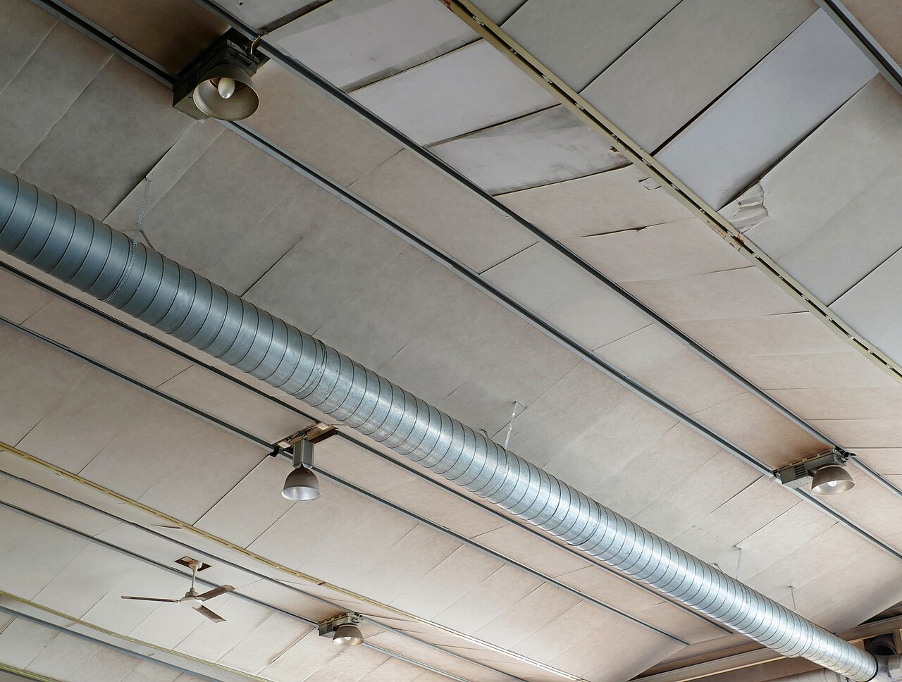 The ceiling of an old disused mechanical workshop