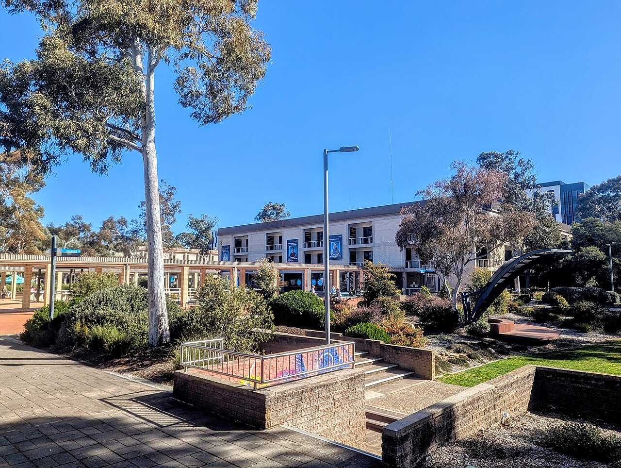 A university concourse and building in Canberra